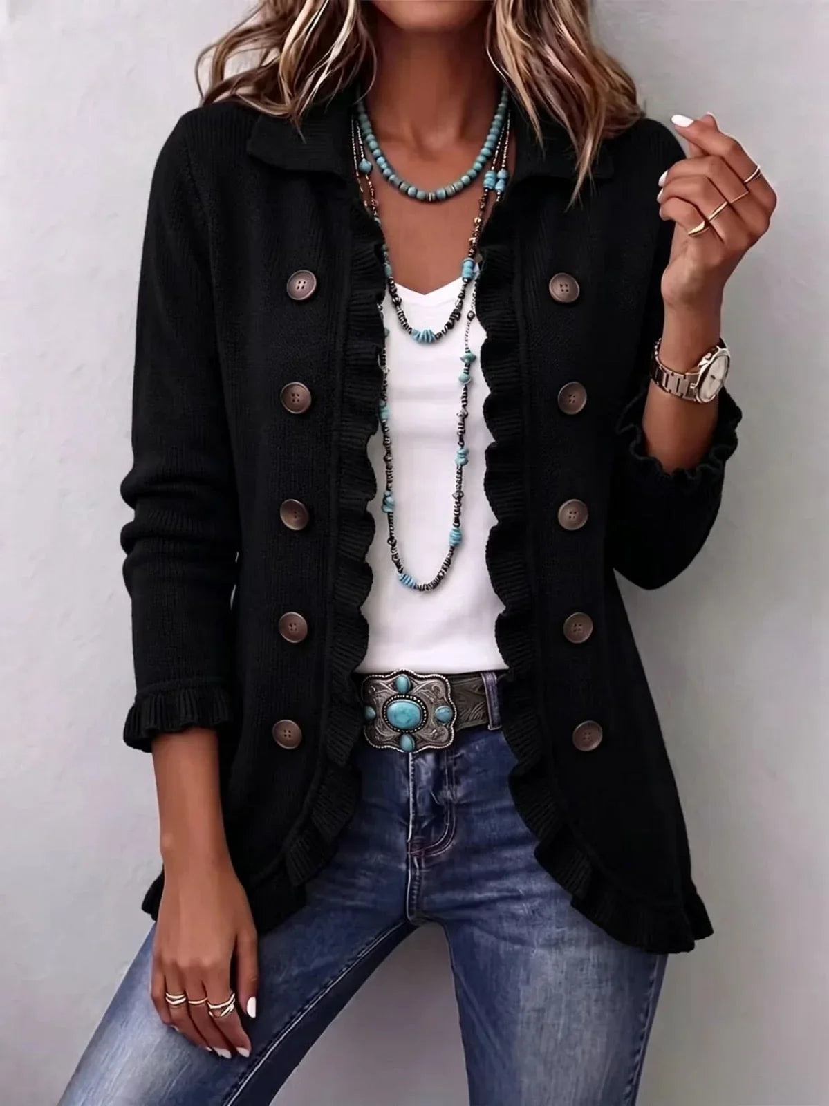 Angela | Chaqueta de punto negra con volantes