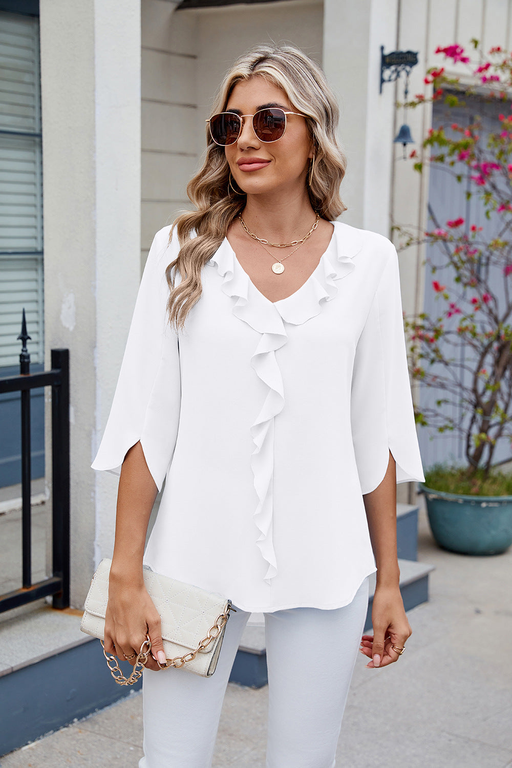 Bibiana | Blusa con volantes y escote en pico
